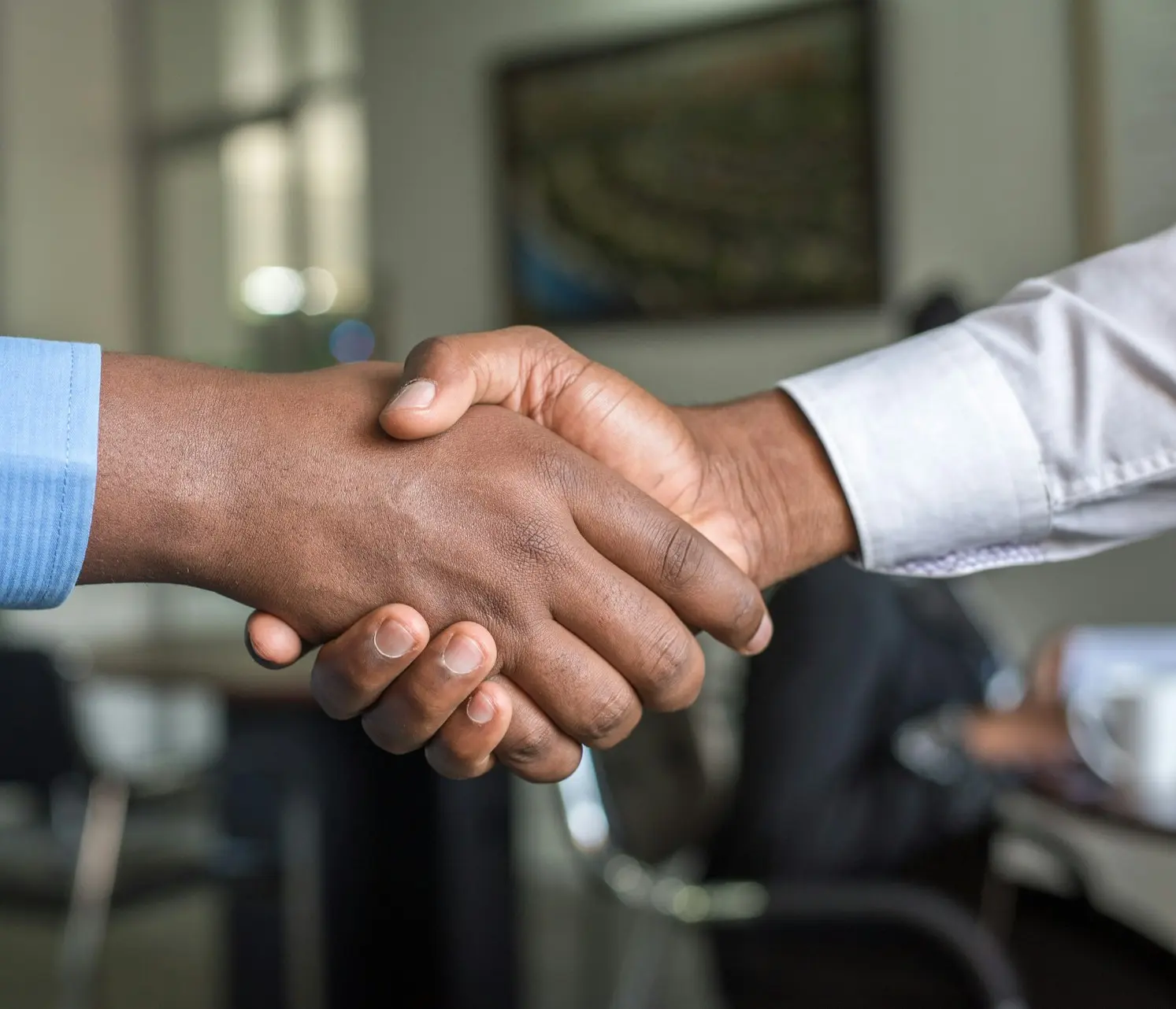 two people shaking hands